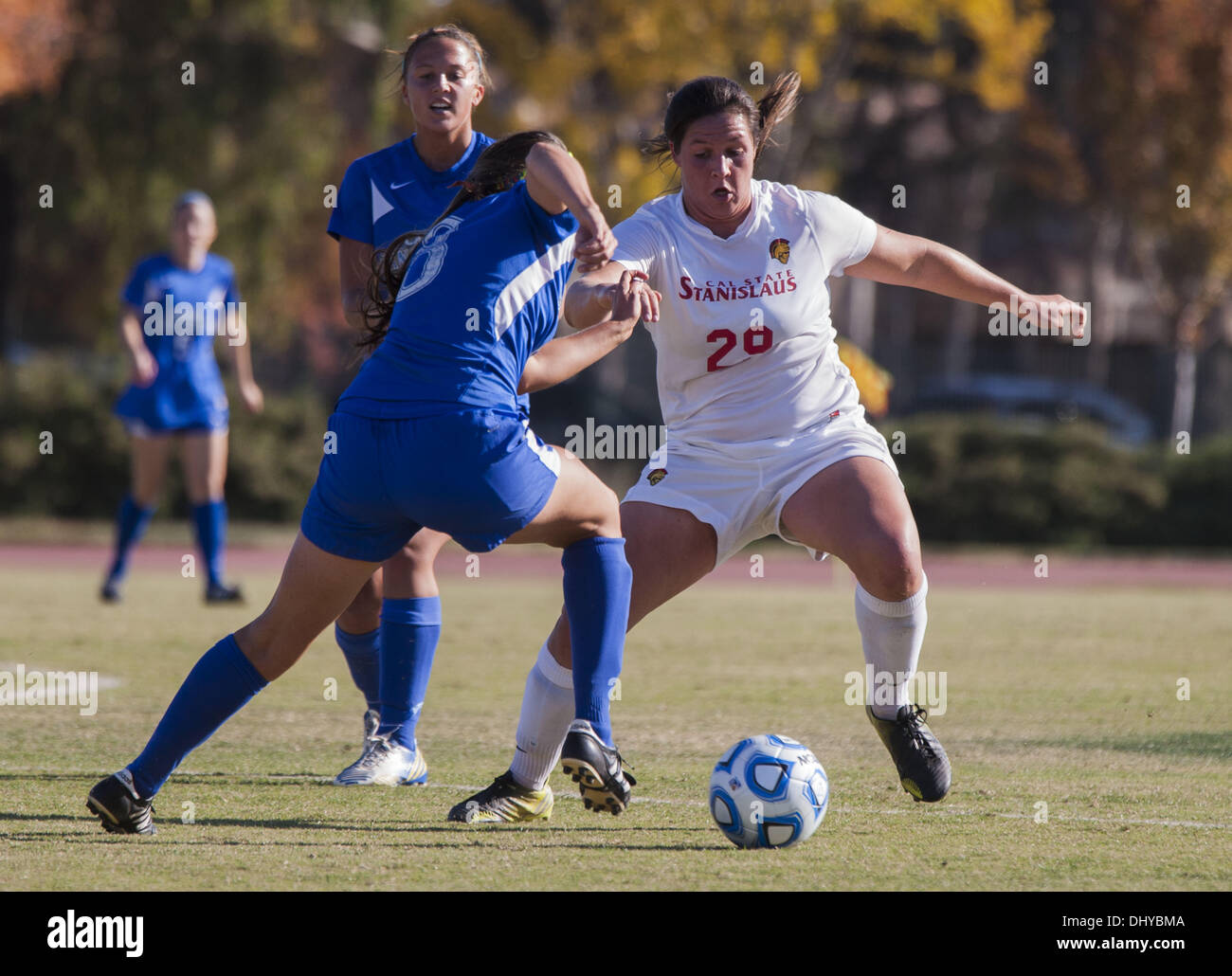 Turlock, CA, USA. 16th Nov, 2013. CSU Stanislaus Katelyn Nebesnick(29) works the ball against Kelly Keyes(8) San Bernardino. San Bernardino wins in overtime 1-0. NCAA Womens Soccer Championships CSU Stanislaus vs CSU San Bernardino at CSU Stanislaus in Turlock CA. © Marty Bicek/ZUMAPRESS.com/Alamy Live News Stock Photo