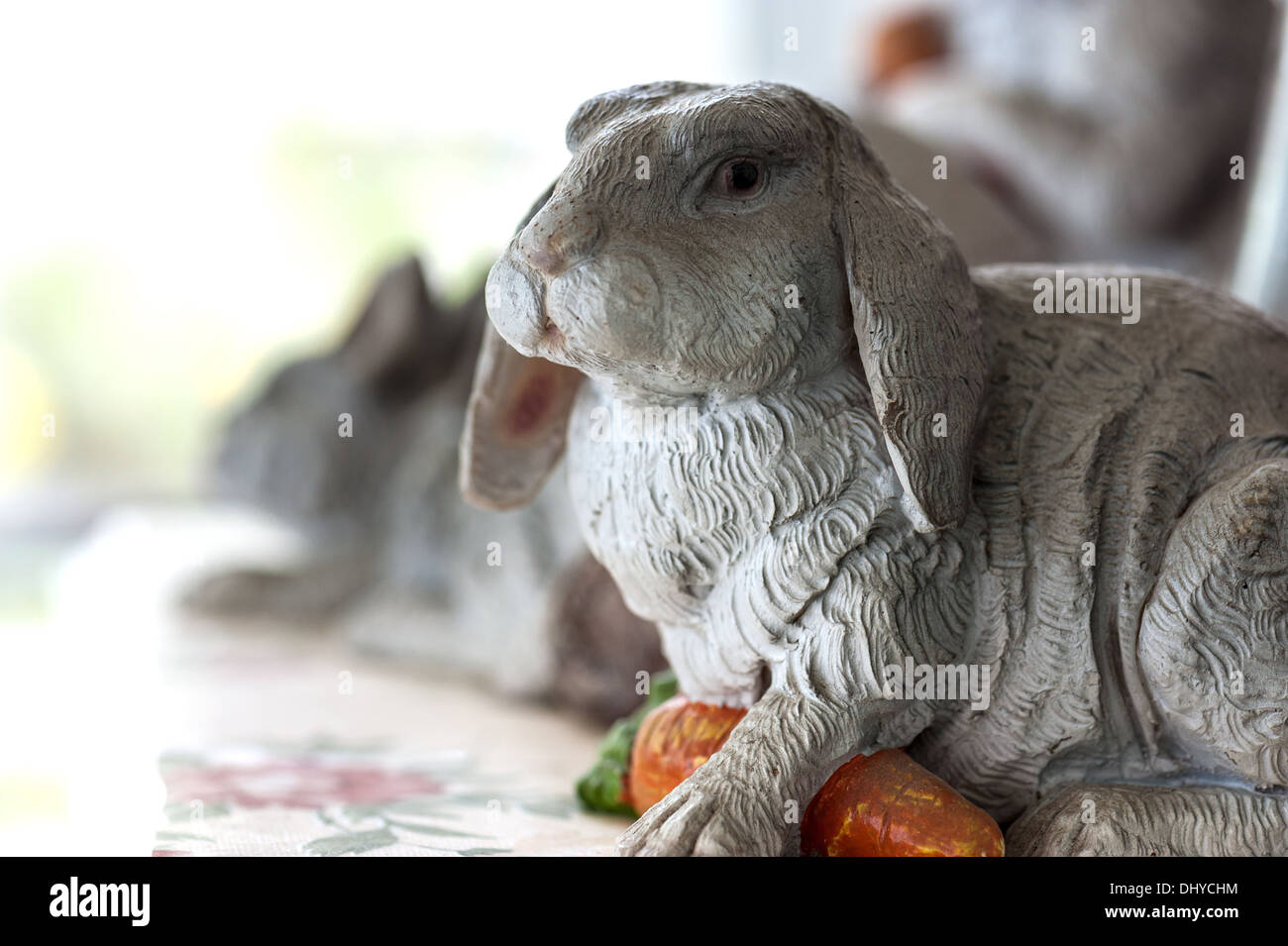 Concrete Rabbits in vintage room Stock Photo - Alamy