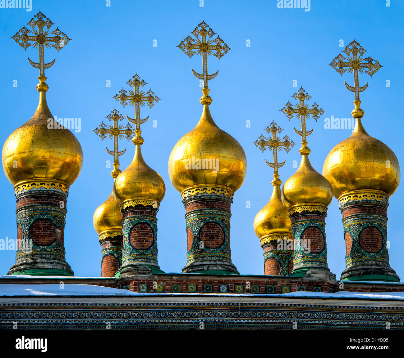 Detail of cupolas in The Upper Saviour's Cathedral and Terem Churches in the Kremlin in Moscow Stock Photo