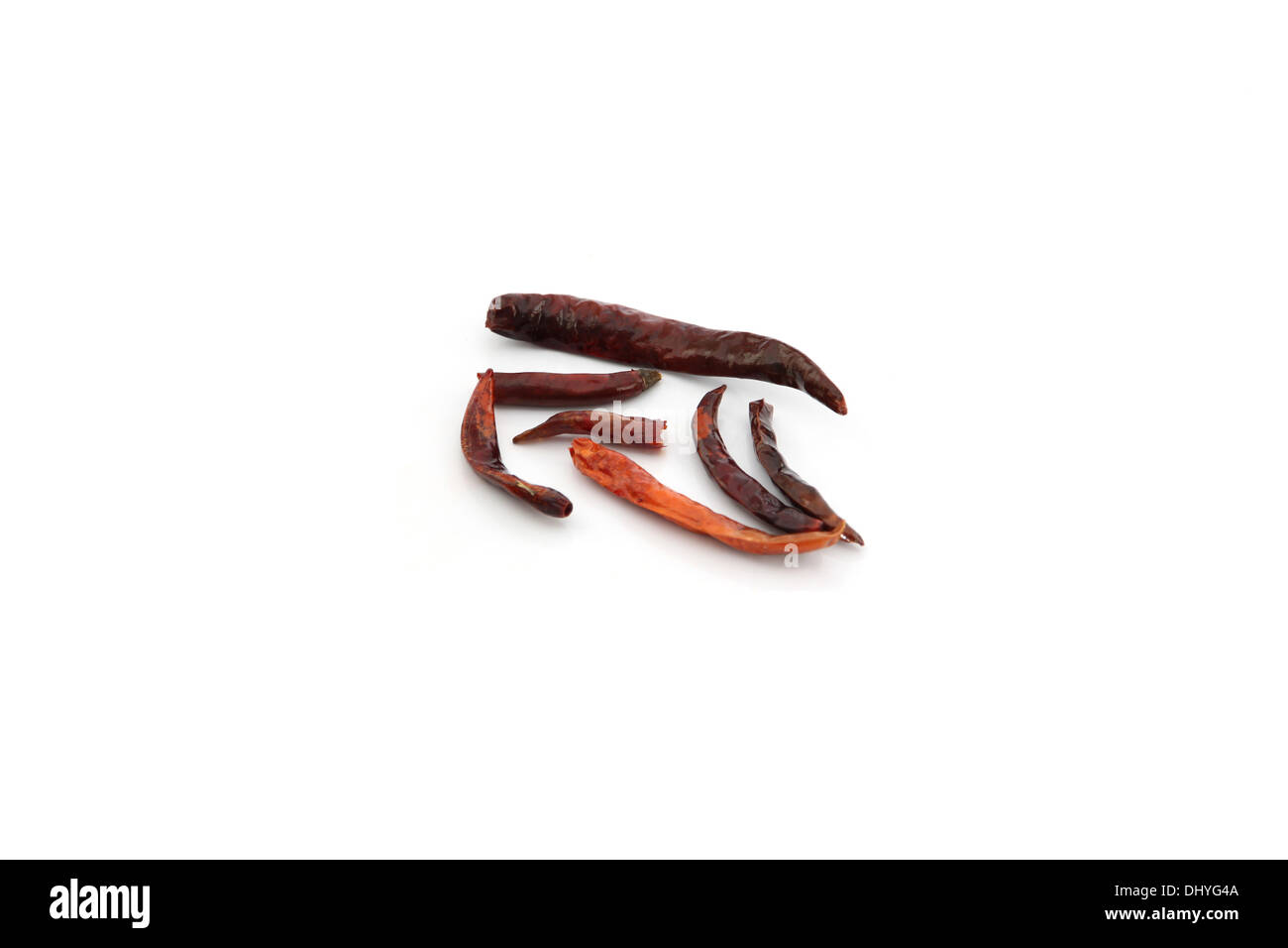 Dry Spicy red hot pepper on the white background. Stock Photo
