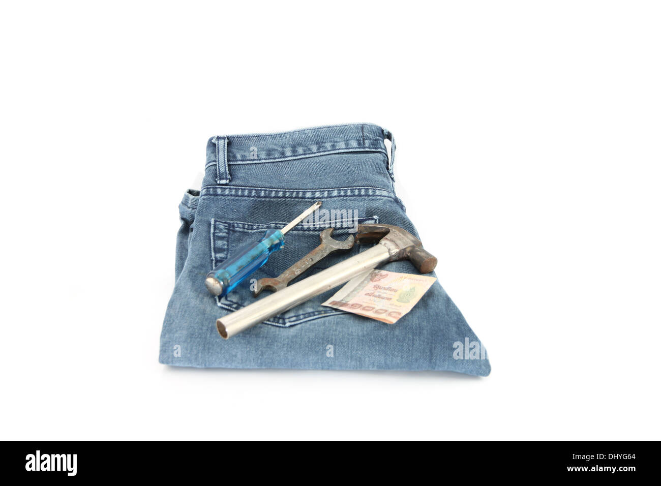 Blue Jeans,Tools and money on white background. Stock Photo