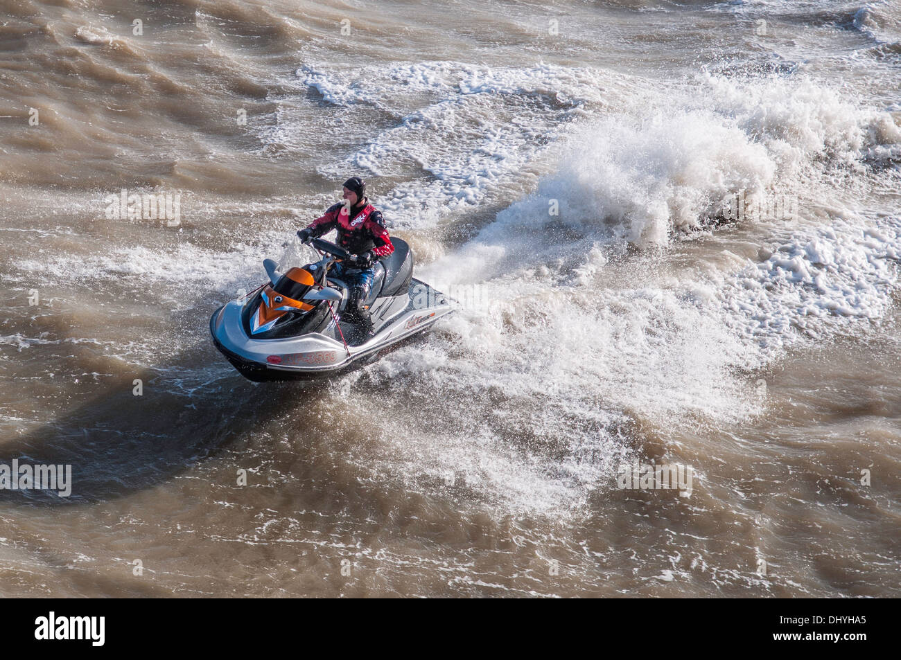 Jetski  ( personal watercraft ) in rough seas at Brighton ,East Sussex ,England UK Stock Photo