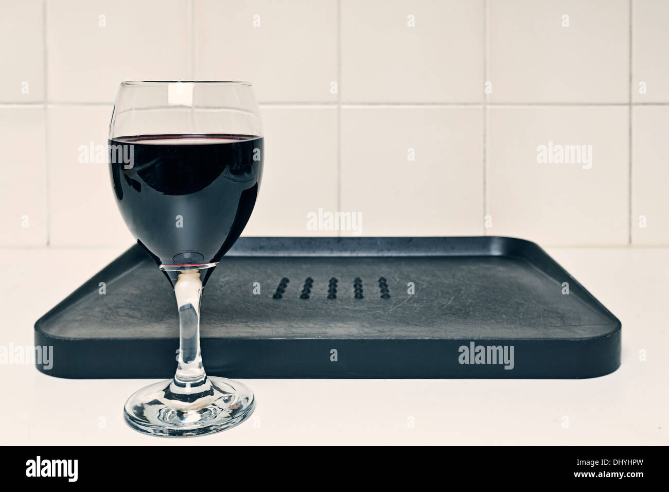 Wine Glass by Chopping Board Stock Photo