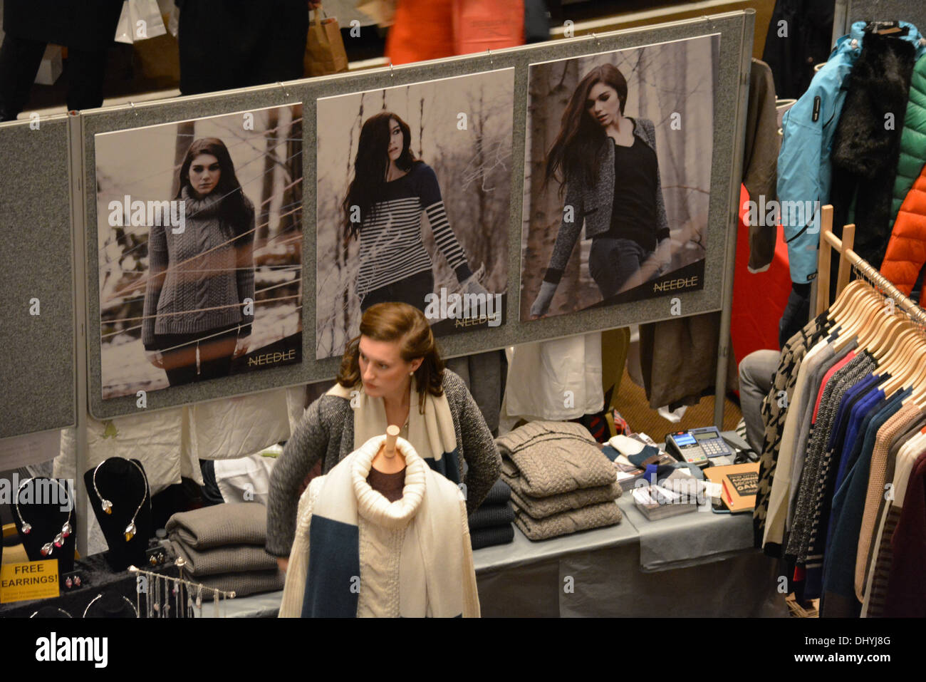 Woman working on a market stall at the Boutique de Noel, London. Stock Photo