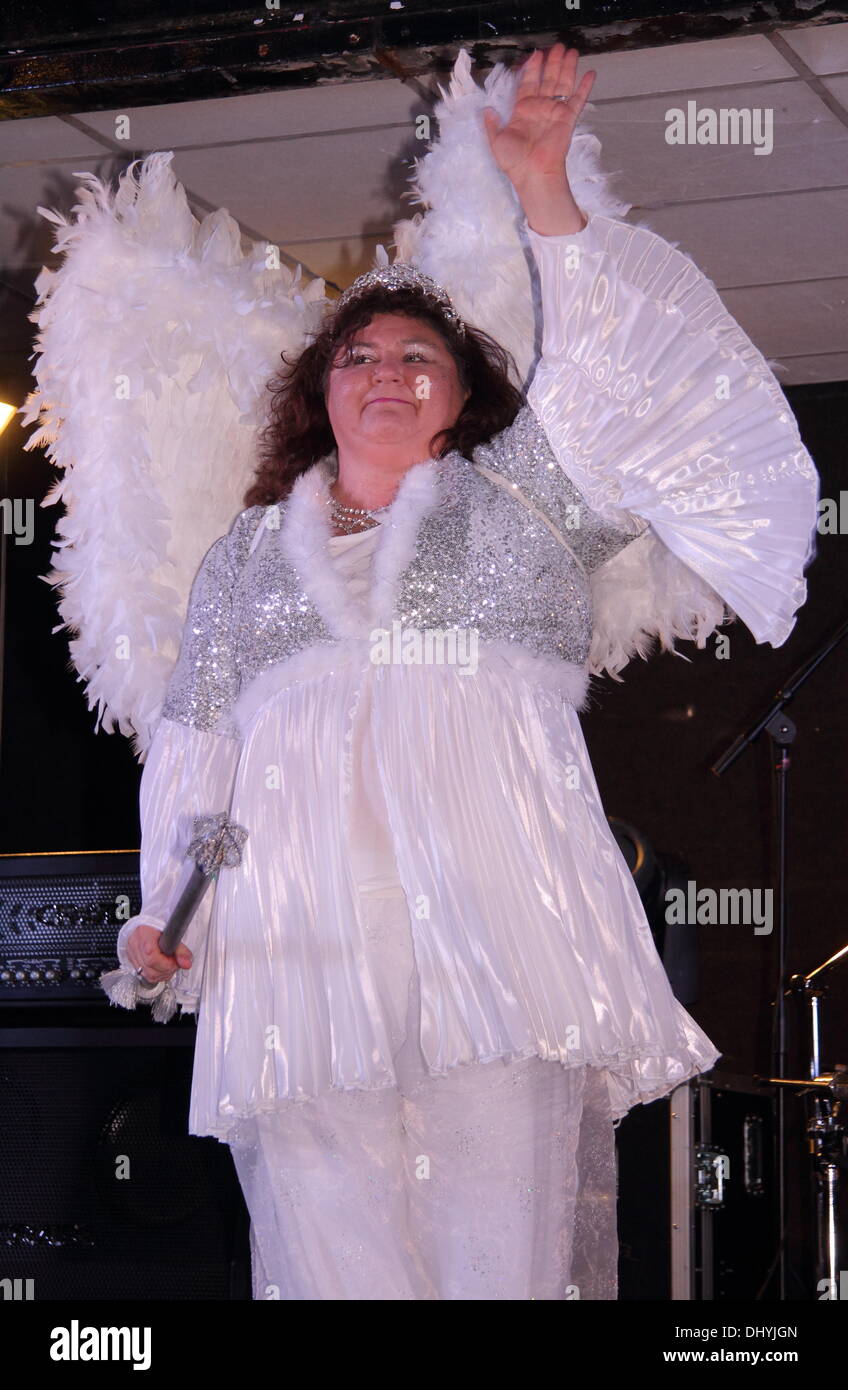 16 Nov. 2013.  Derby, UK. 16th Nov, 2013. Cheryl Fergison, dressed as her pantomime character ‘Spirit of the Beans’ on stage at Derby city centre’s Capital FM Christmas Lights Switch-on in association with Derby Live.  Cheryl Fergison is starring in Jack and the Beanstalk at the Assembly Rooms in Derby, 4 Dec – 5 Jan alongside actor, George Telfer. Credit:  Deborah Vernon/Alamy Live News Stock Photo