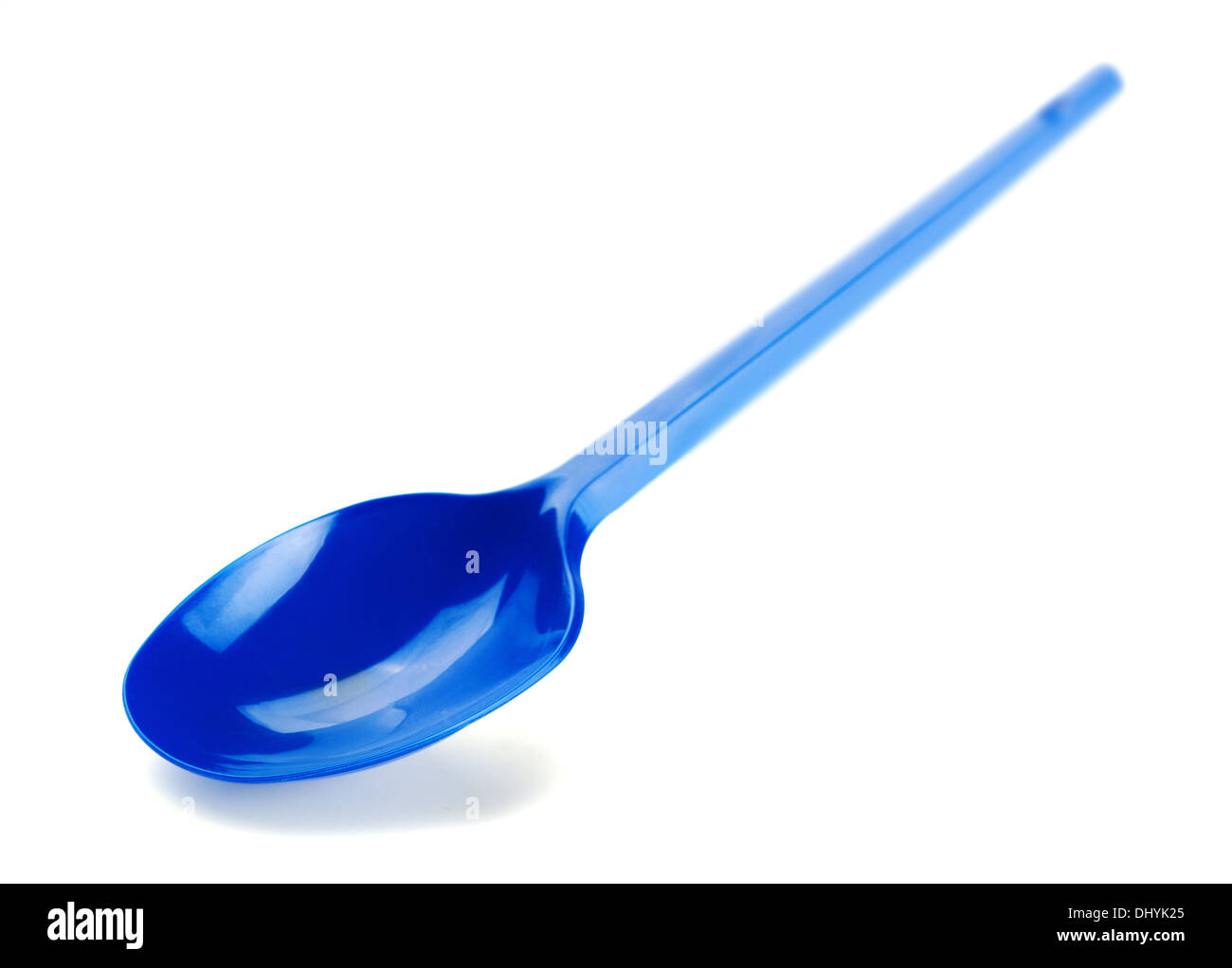 Blue spoon on a white background Stock Photo