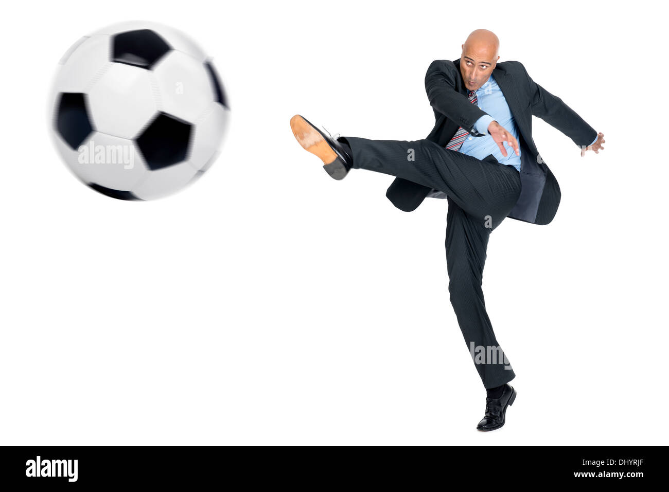 Businessman playing soccer ball isolated in white Stock Photo - Alamy