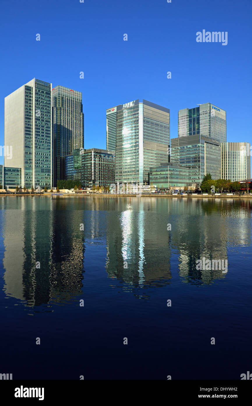 Towering development reflected in West India Dock, South Dock, Canary Wharf Estate, Docklands, East London E14, United Kingdom Stock Photo