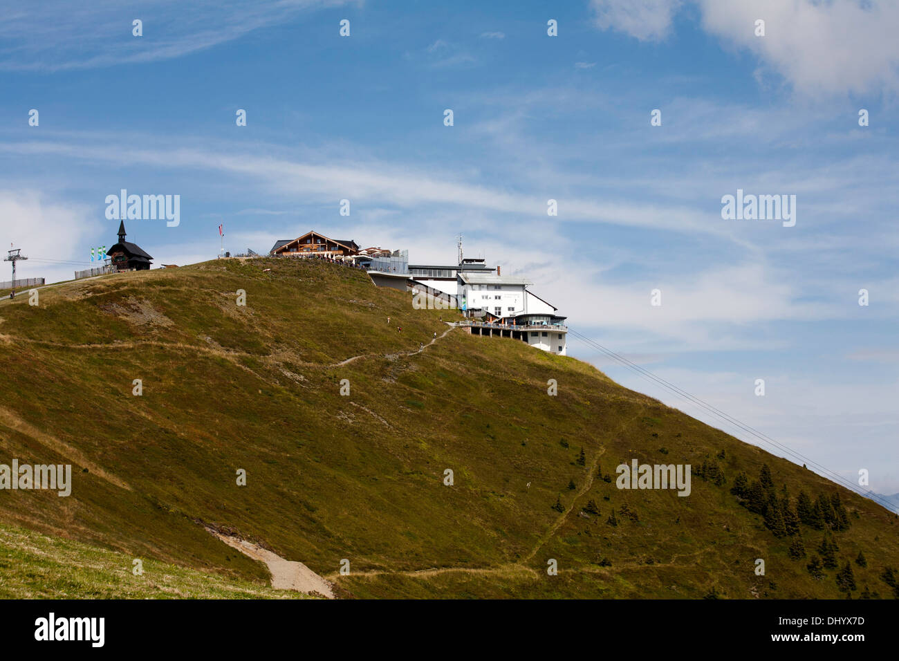The cable car station ski lift and chapel at the summit of The Schmittenhohe above Zell am See Salzburgerland Austria Stock Photo