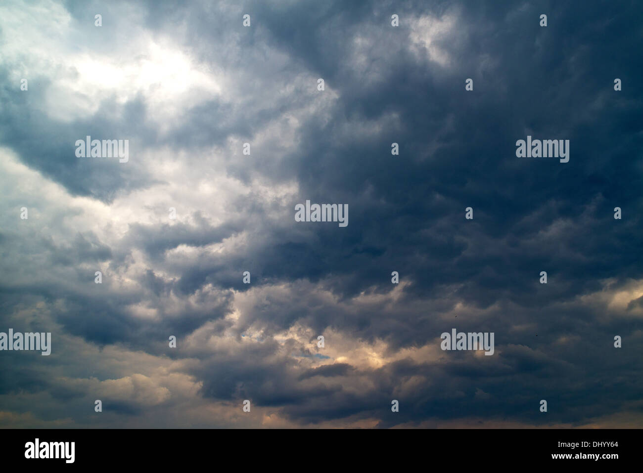 Heavy gray storm clouds bringing the cold winter rain Stock Photo