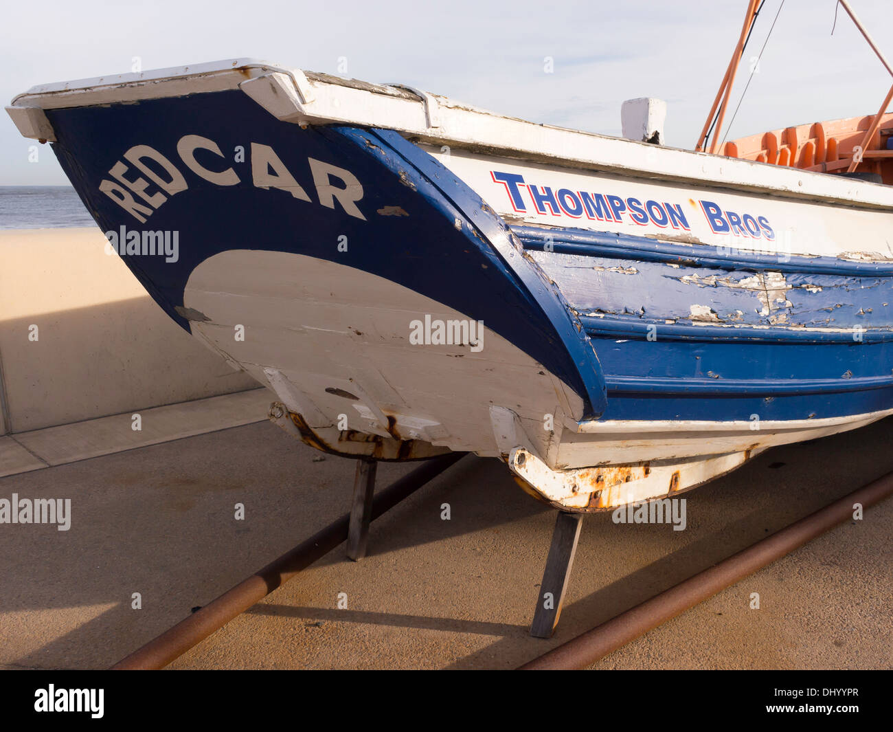 Stern detail of a Yorkshire coble fishing boat with ...