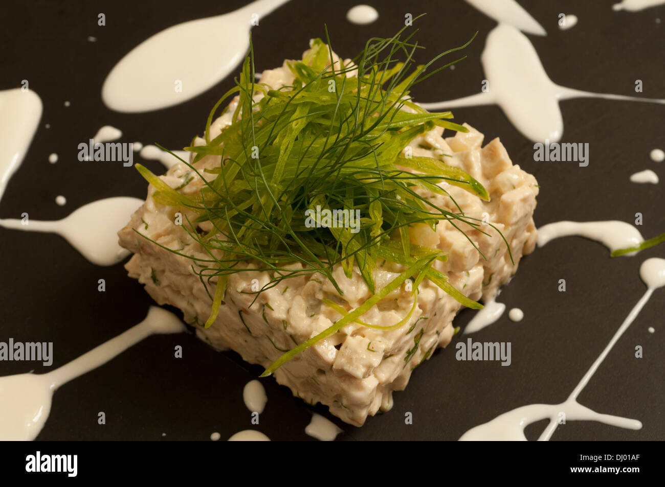 Marinated chicken Tartar with yogurt, dill, celery and turnip Stock Photo