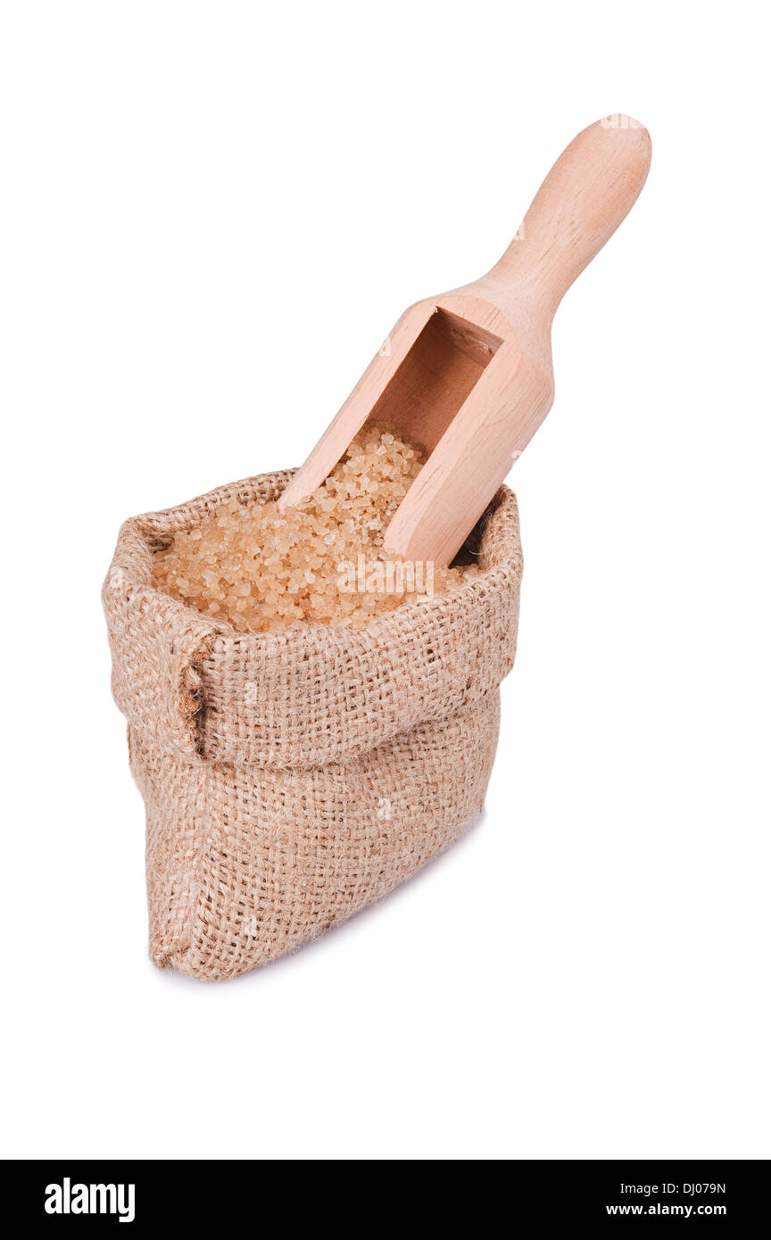 Burlap bag with brown sugar cane on white background Stock Photo