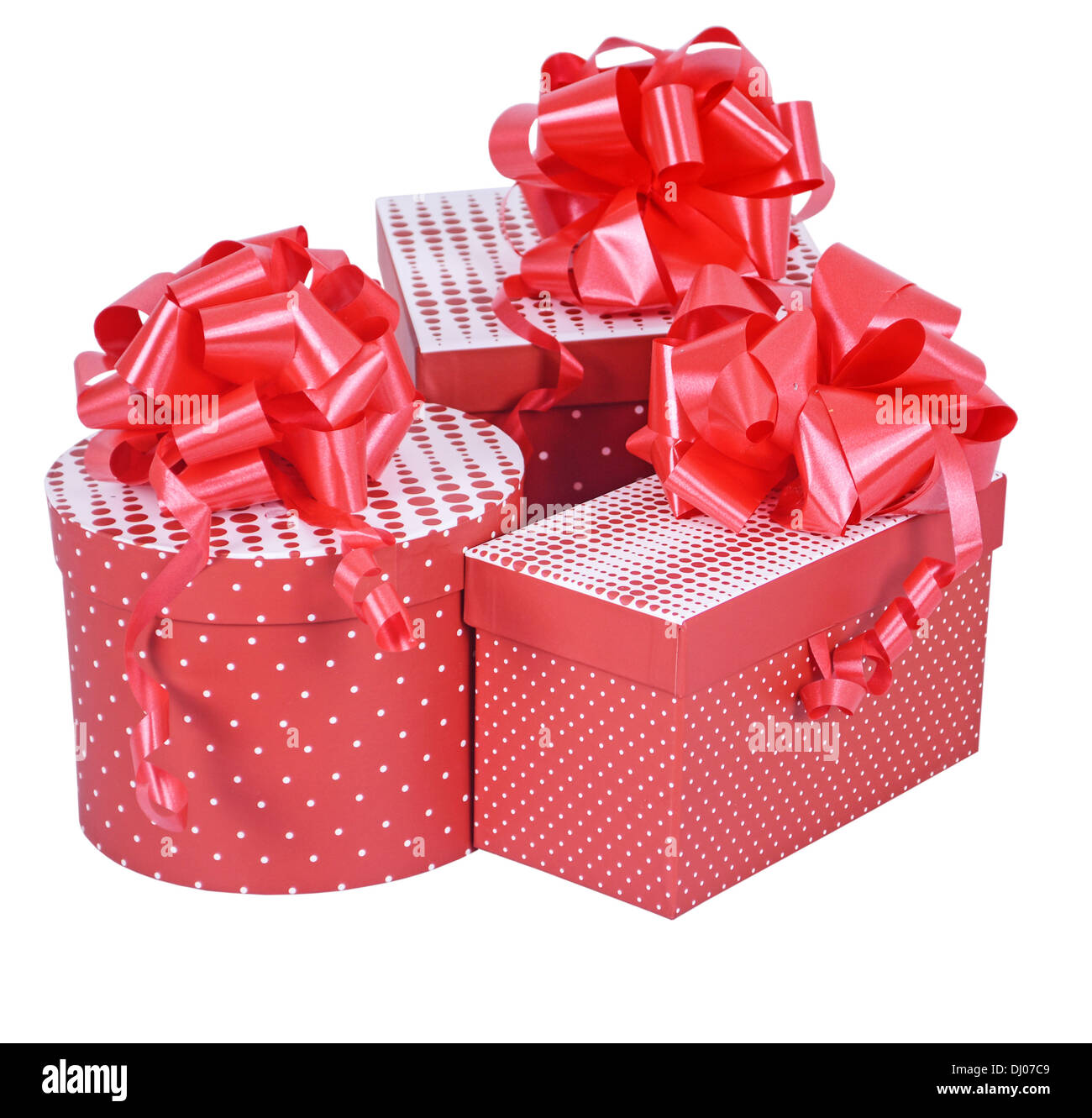 Red gift boxes with ribbon bow isolated on white Stock Photo - Alamy