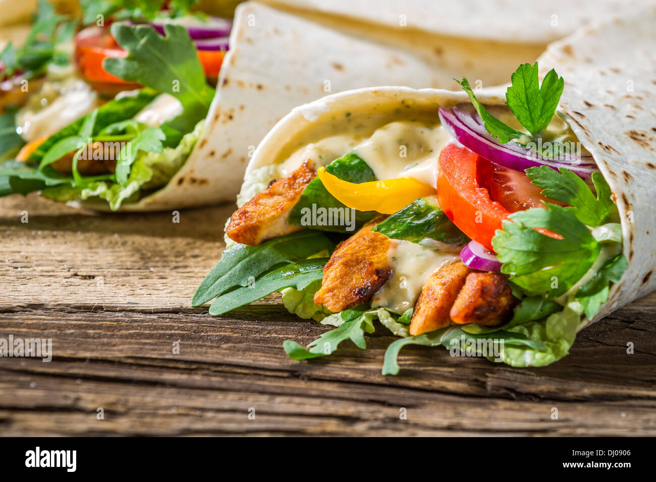 Closeup of tasty kebab with vegetables and chicken Stock Photo