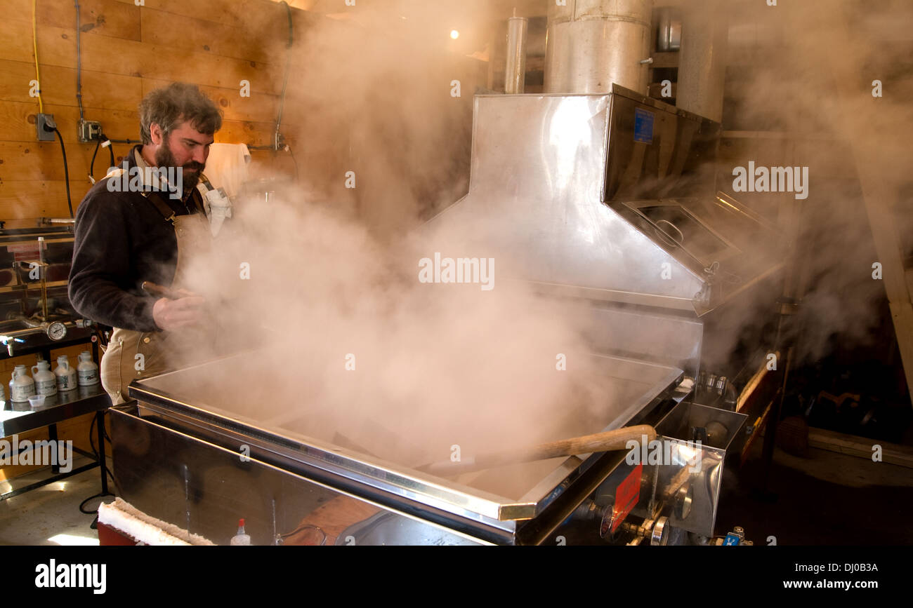 A New Hampshire farmer boils maple sap into maple syrup Stock Photo Alamy