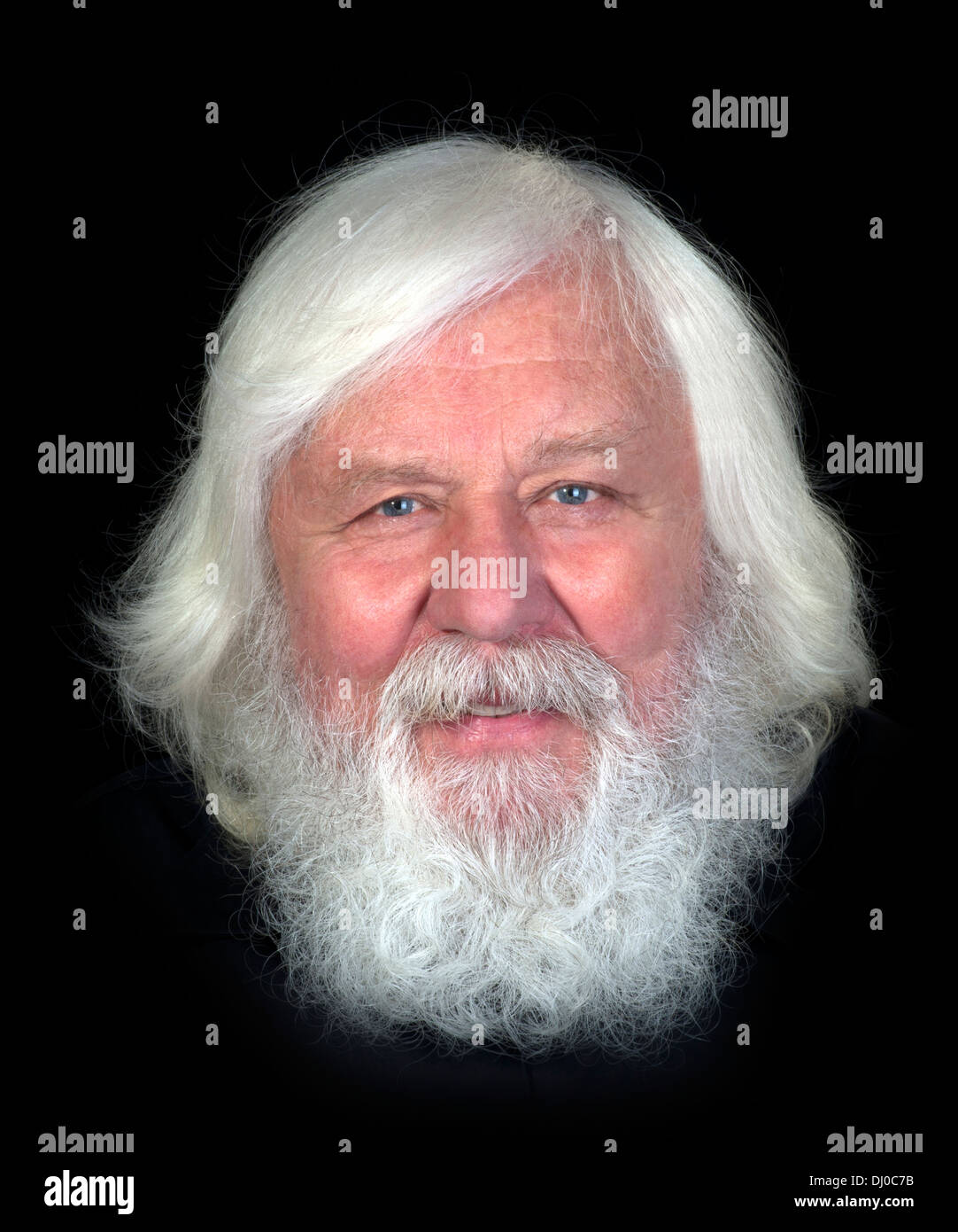 Happy and healthy elderly man with full beard, smiling Stock Photo