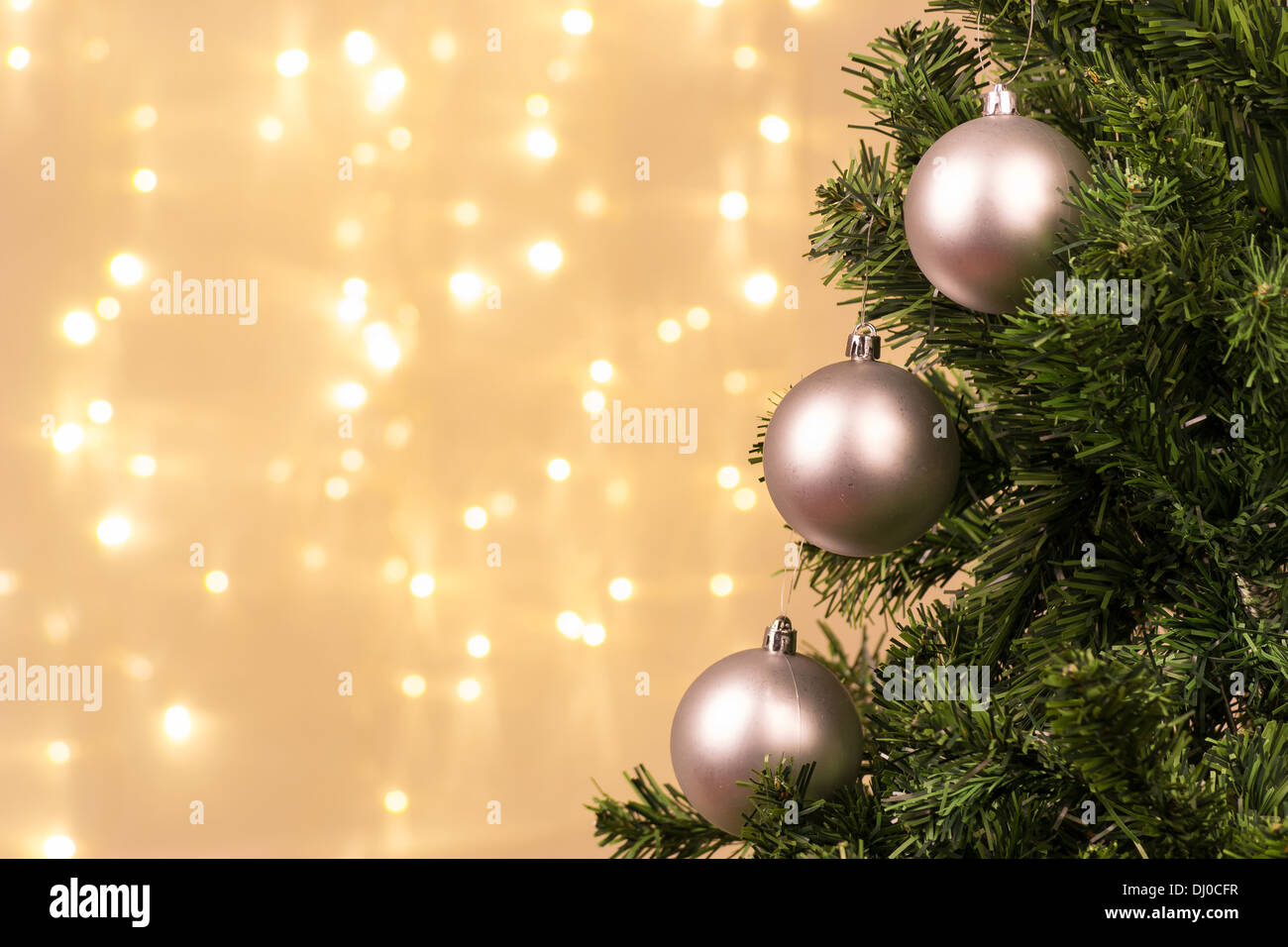 Christmas tree decoration with ball lights Stock Photo - Alamy