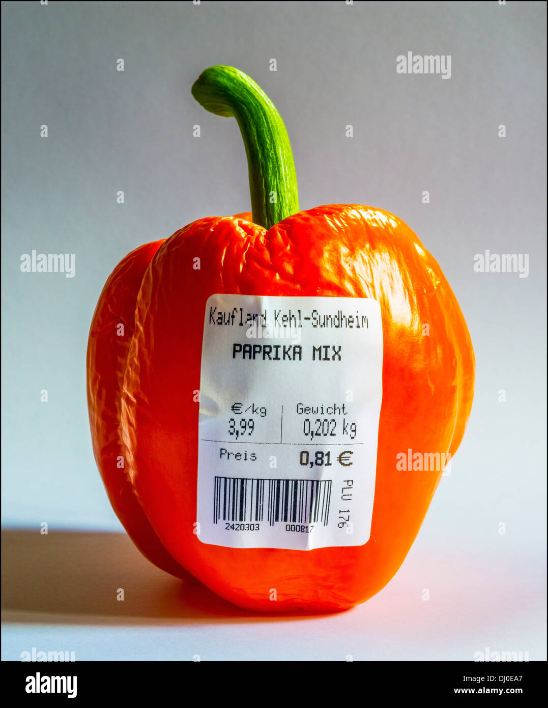 One red bell pepper with German bar-coded label showing weight and price in  Euro Stock Photo - Alamy