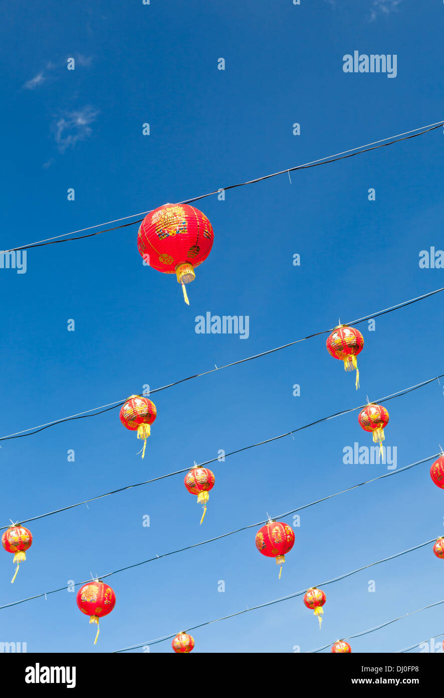 Red chinese new year lanterns against blue sky Stock Photo - Alamy