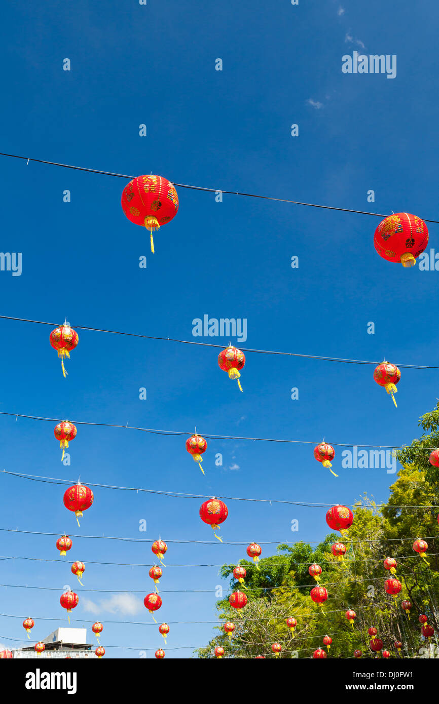 Red chinese new year lanterns against blue sky Stock Photo - Alamy
