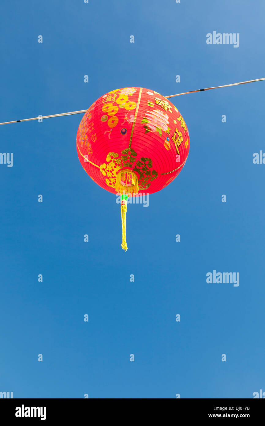 Red chinese new year lanterns against blue sky Stock Photo - Alamy