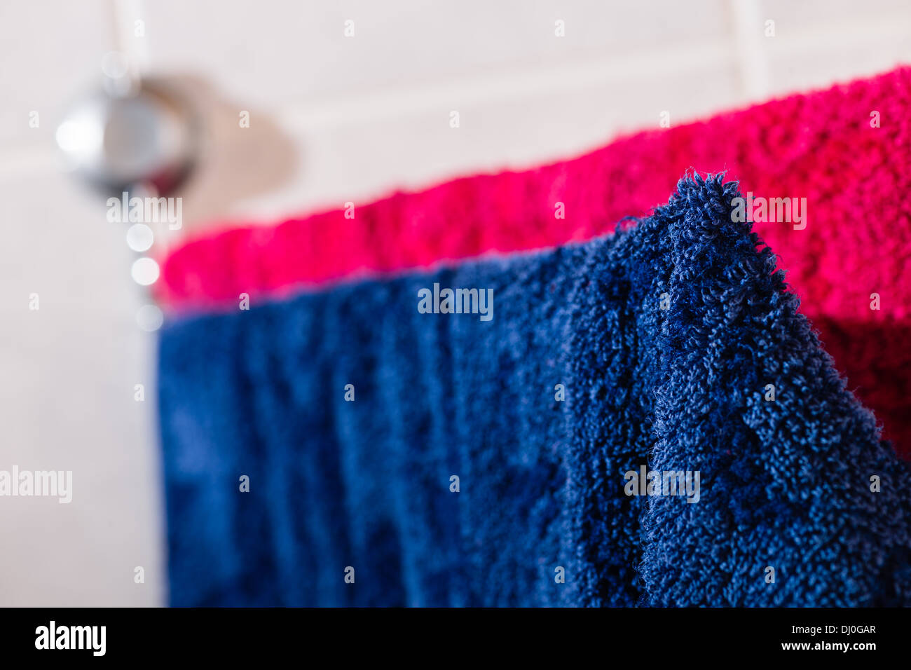 Two towels drying up on the wall rack Stock Photo