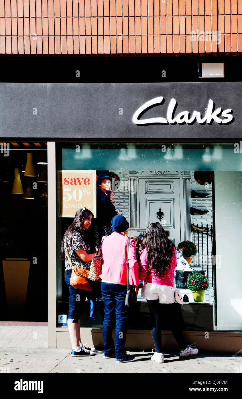Clarks shoe shop and shoppers, Oxford Street, London, England, UK, Europe Stock Photo