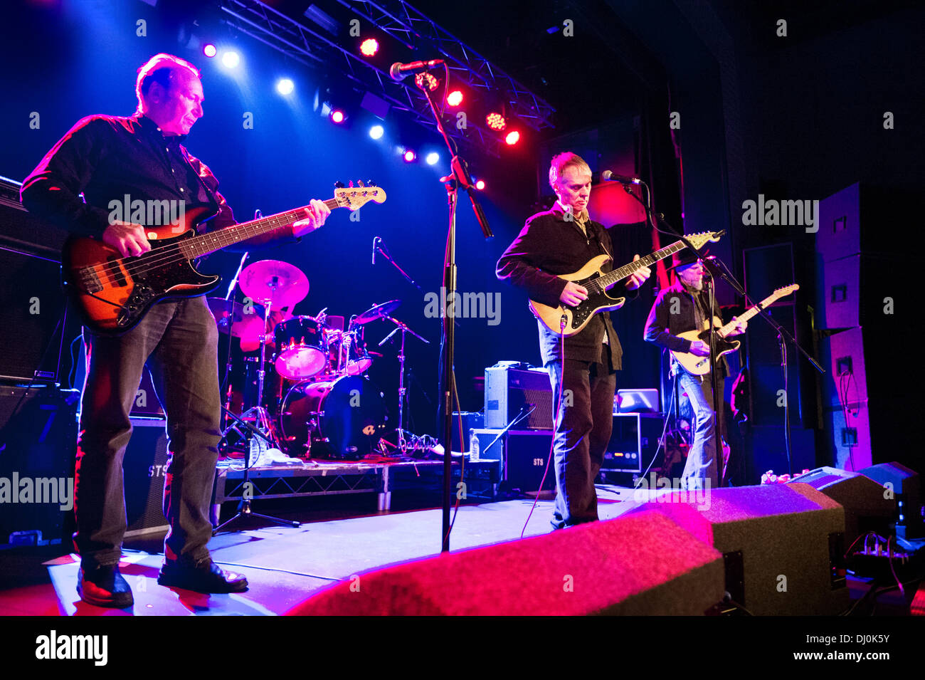 Manchester, UK. 17th November 2013. US rock band Television in concert at Manchester Academy. Fred Smith (bass), Tom Verlaine and Jimmy Rip (guitars). Stock Photo