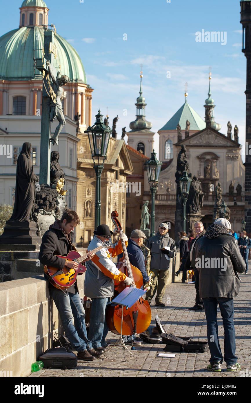 Karluv most - Charles bridge. Musicians. Prague. Stock Photo