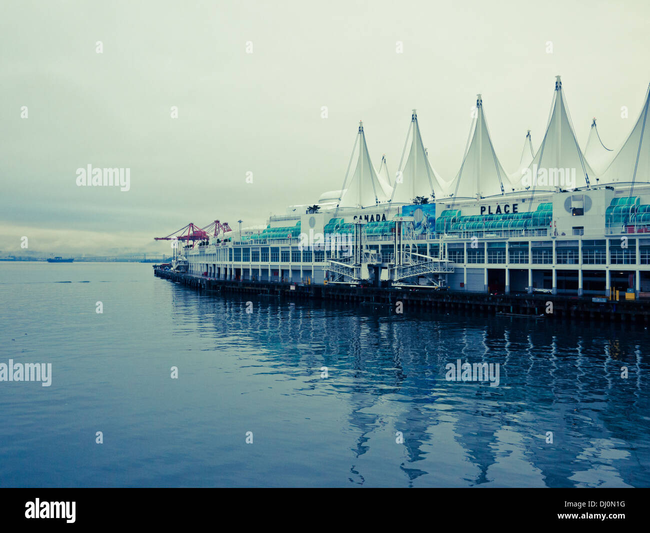 A view of a Canada Place on an overcast, moody day in Vancouver, British Columbia, Canada. Stock Photo