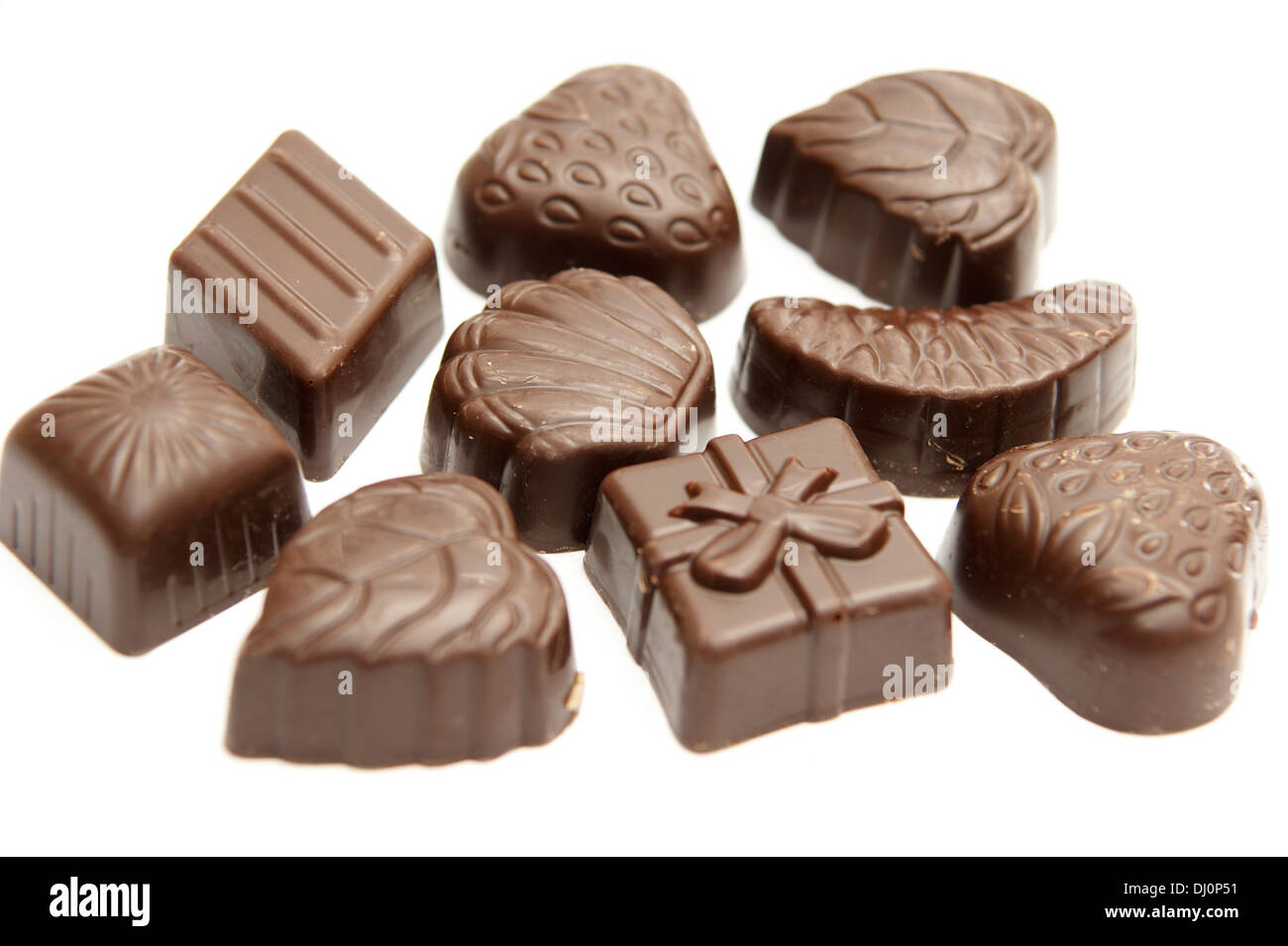 Selection of chocolates sweets on a white backgound Stock Photo