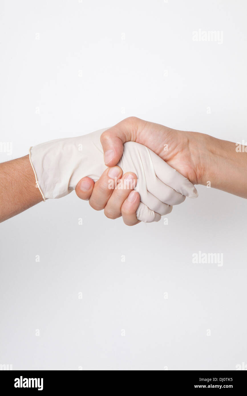 hands of doctor and patient Stock Photo