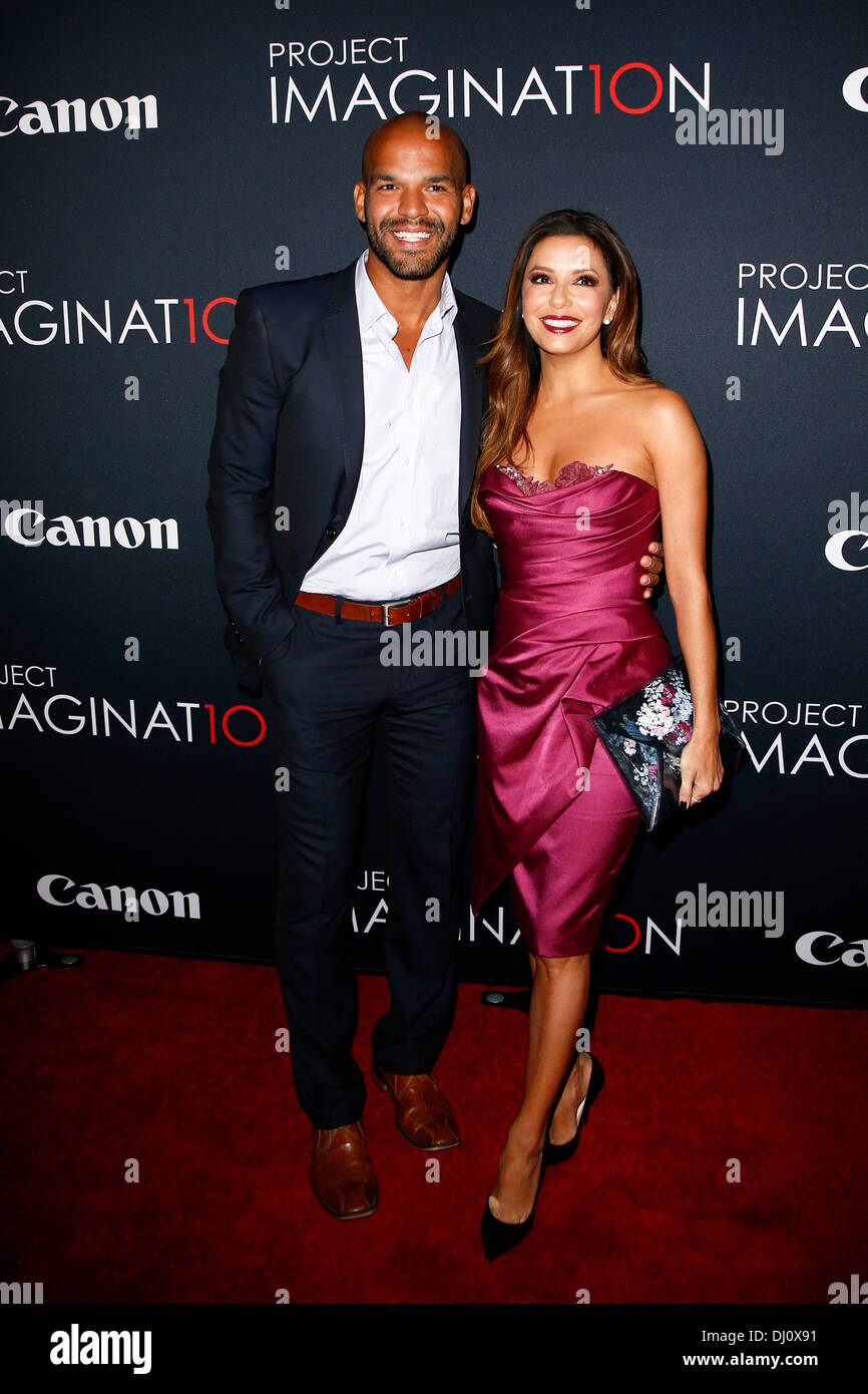 NEW YORK- OCT 24: Actor Amaury Nolasco (L) and Eva Longoria attend the global premiere of Canon's 'Project Imaginat10n' Film Fes Stock Photo