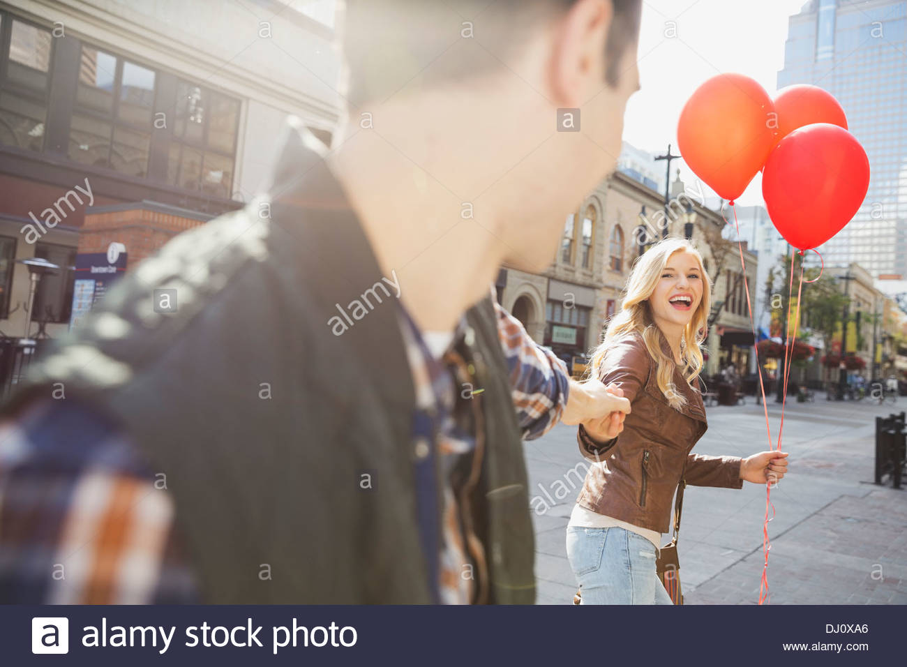Woman leading her man hi-res stock photography and images - Alamy