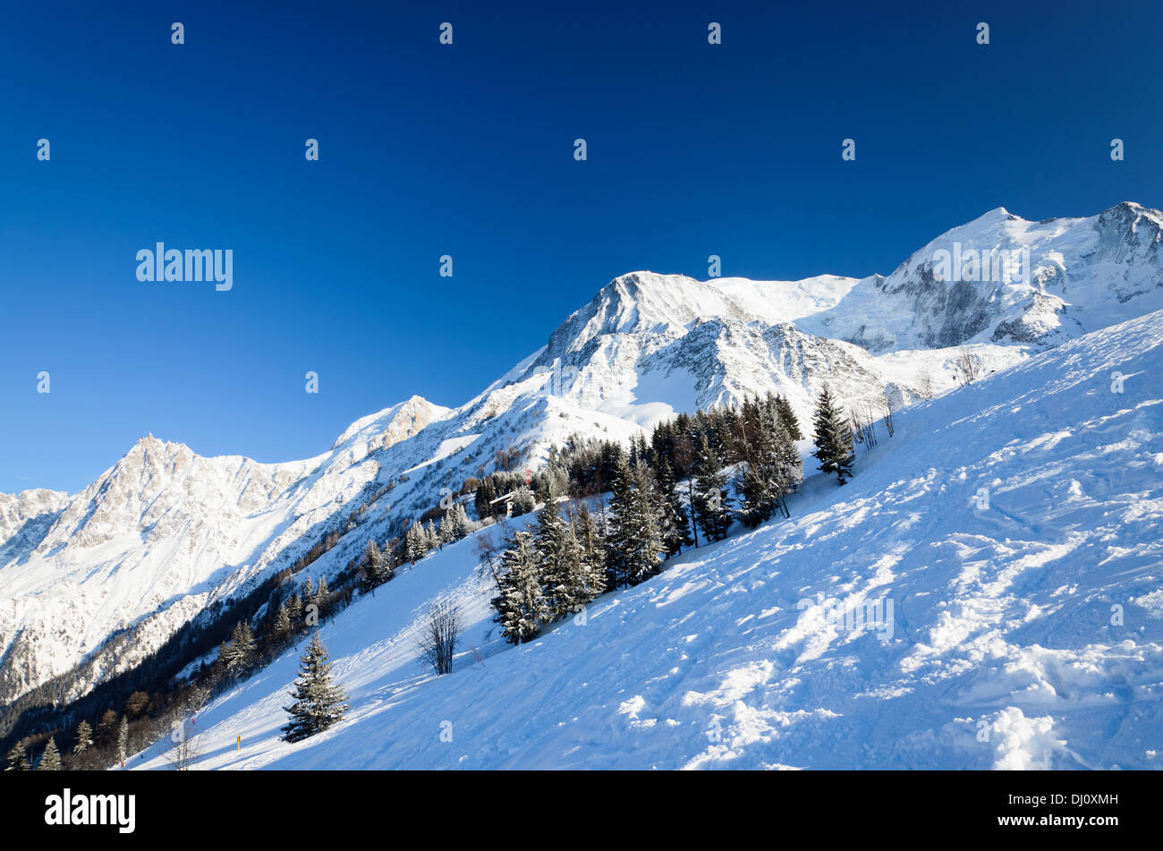 Snow hill with skiing pistes Stock Photo