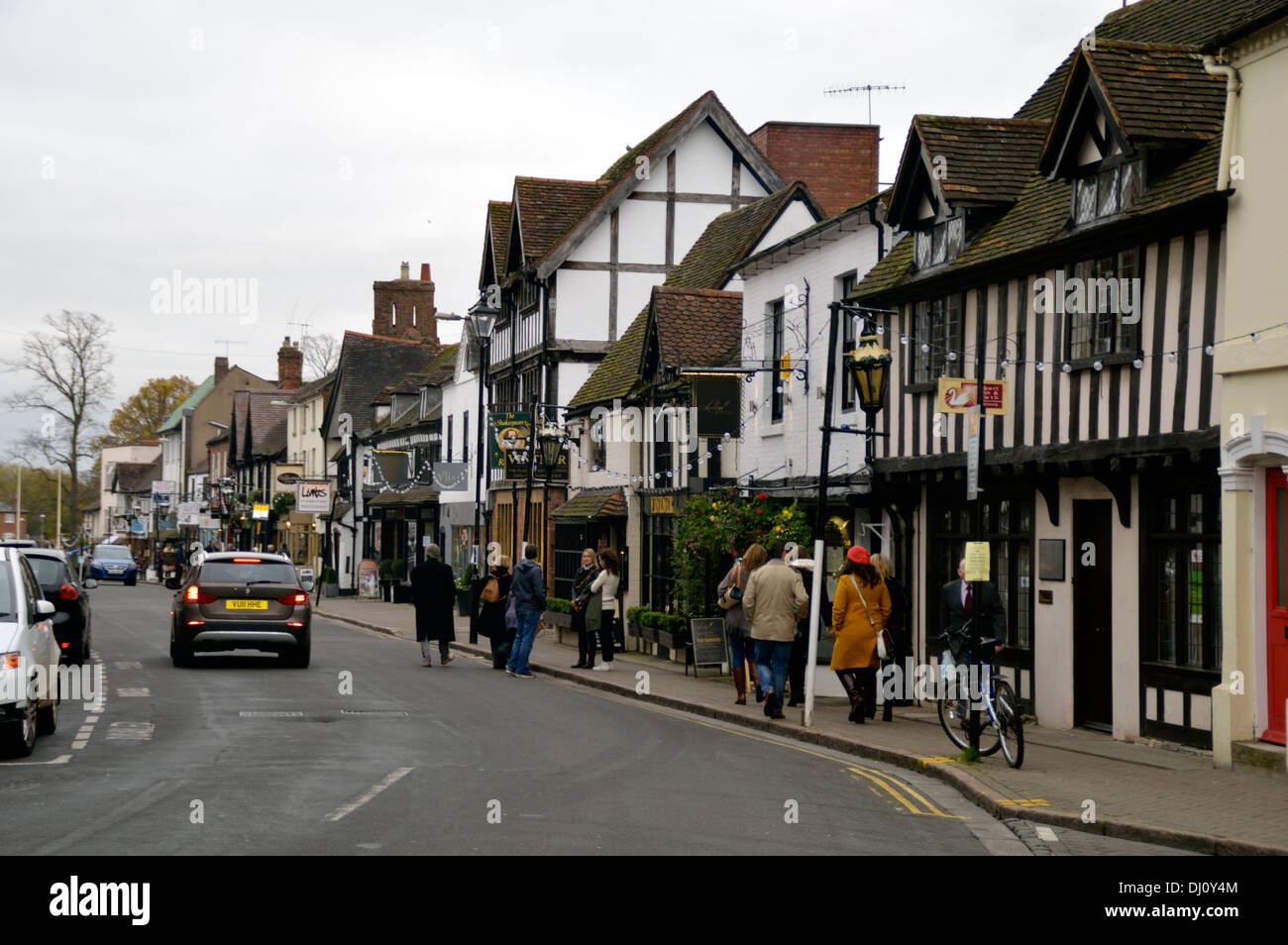 Half timbered buildings on a street in Stratford upon Avon Stock Photo