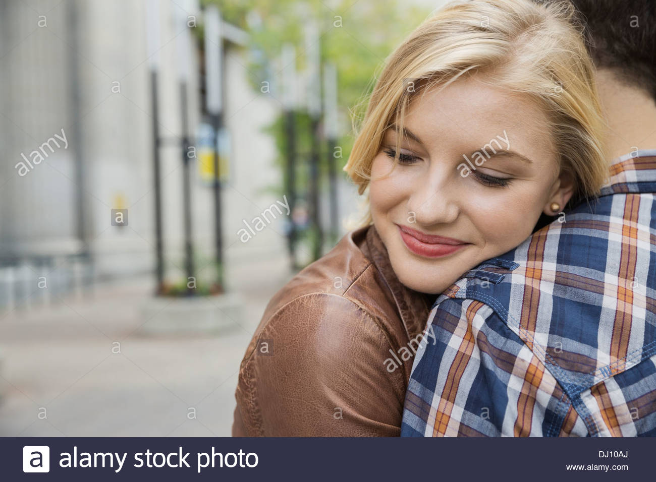 Man woman embracing hi-res stock photography and images - Alamy