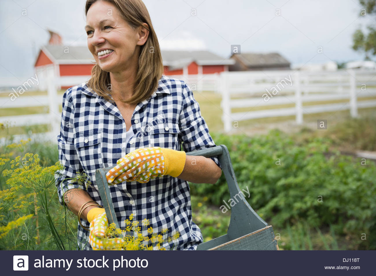Woman standing in garden Stock Photo