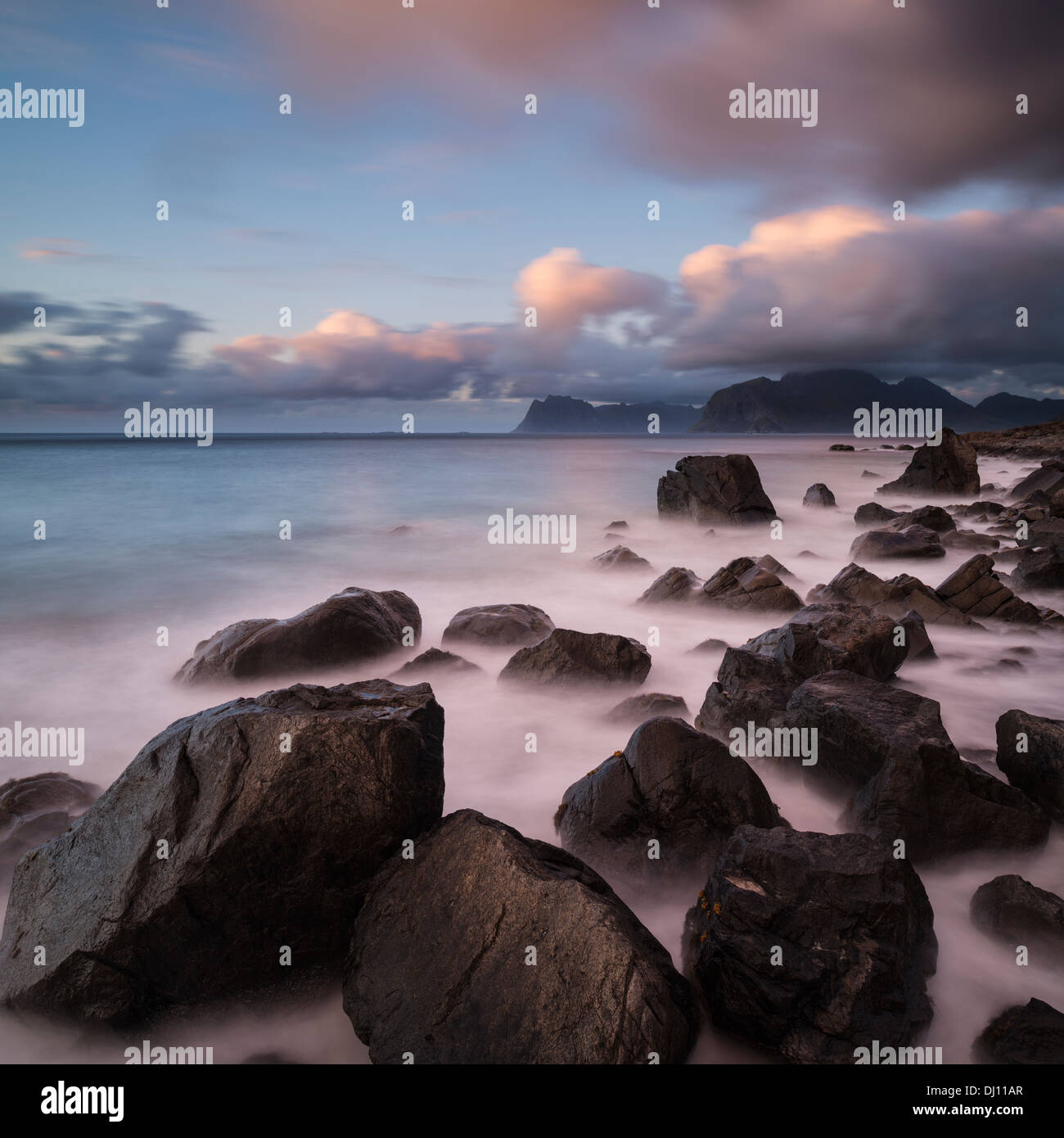 Rugged rocky coastline at Myrland beach, Flakstadoy, Lofoten Islands, Norway Stock Photo