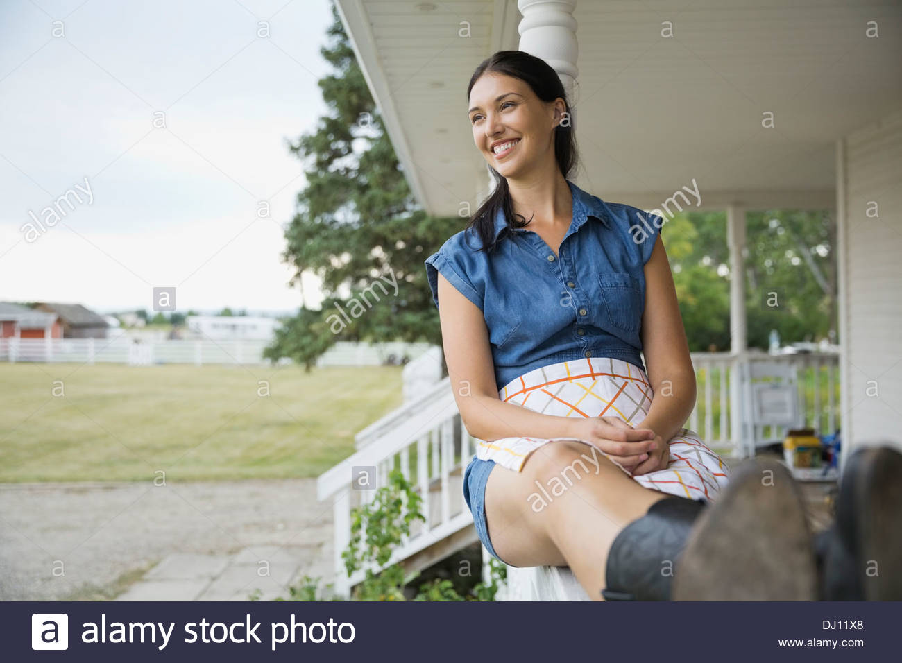 Front view sitting on front porch hires stock photography and images