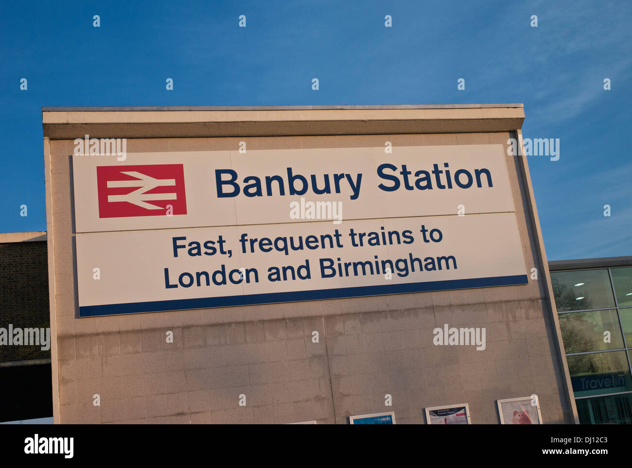 Large sign outside Banbury Railway station in evening sunlight. Stock Photo