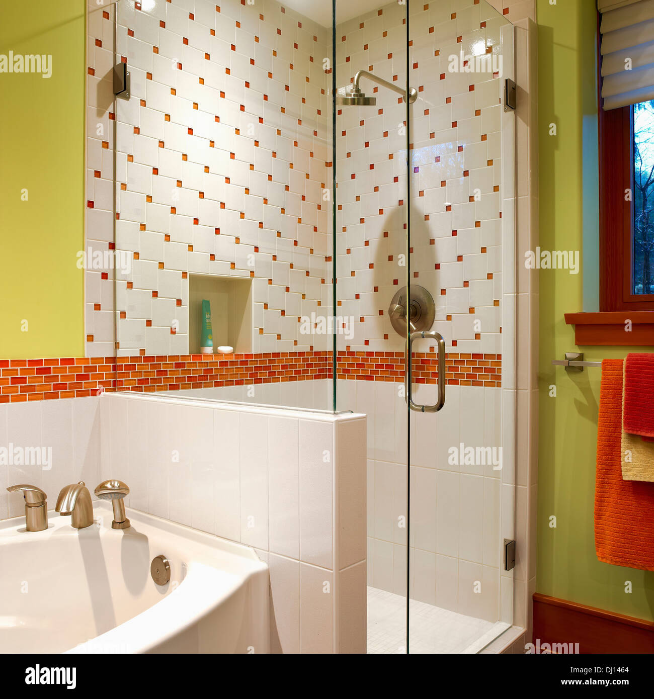 Shower Stall With Lime Green Walls And Orange And White Tiles; Victoria, Vancouver Island, British Columbia, Canada Stock Photo