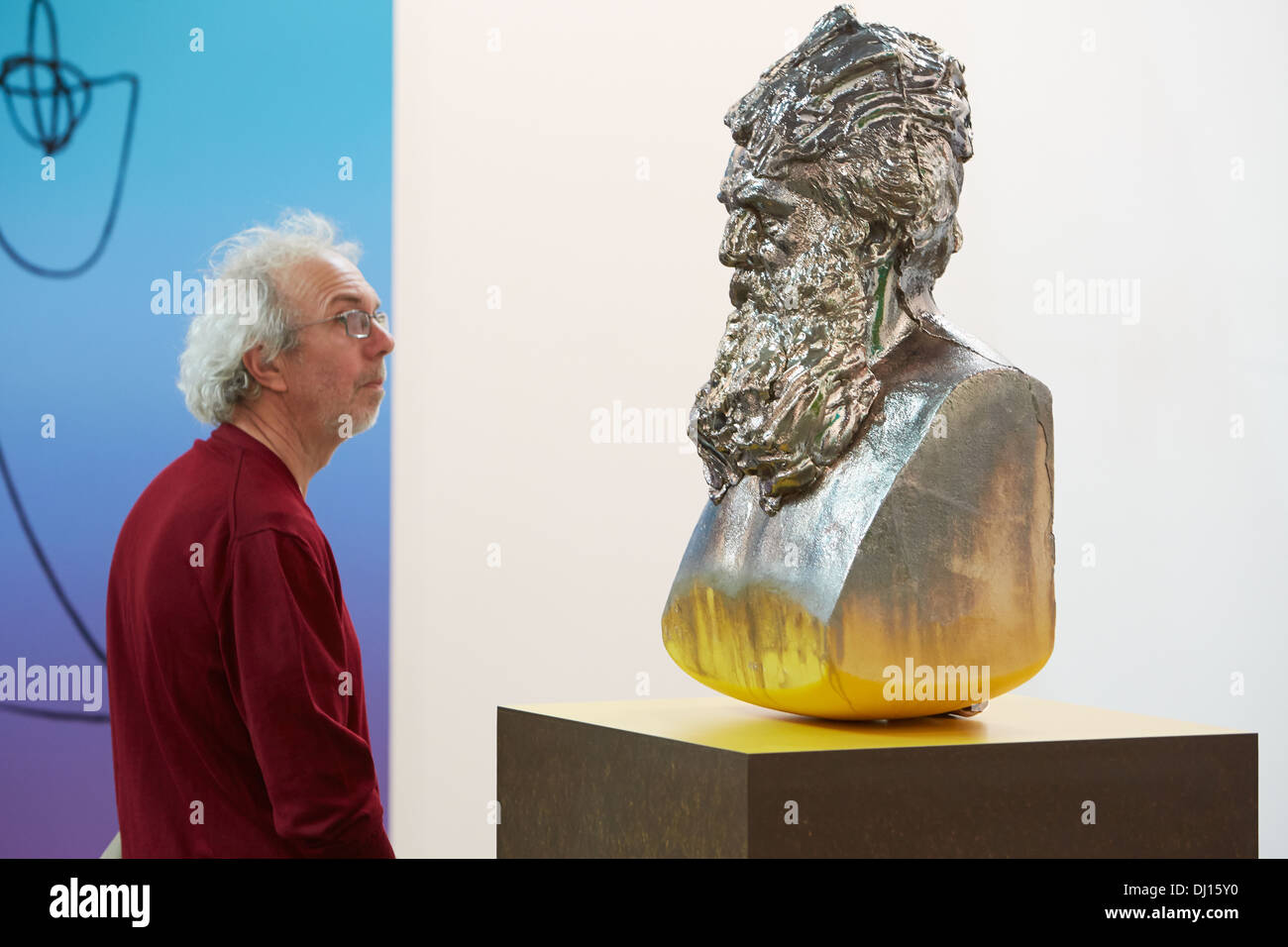Man looking at contemporary sculpture during Artissima 2013 art fair in Turin, Italy Stock Photo