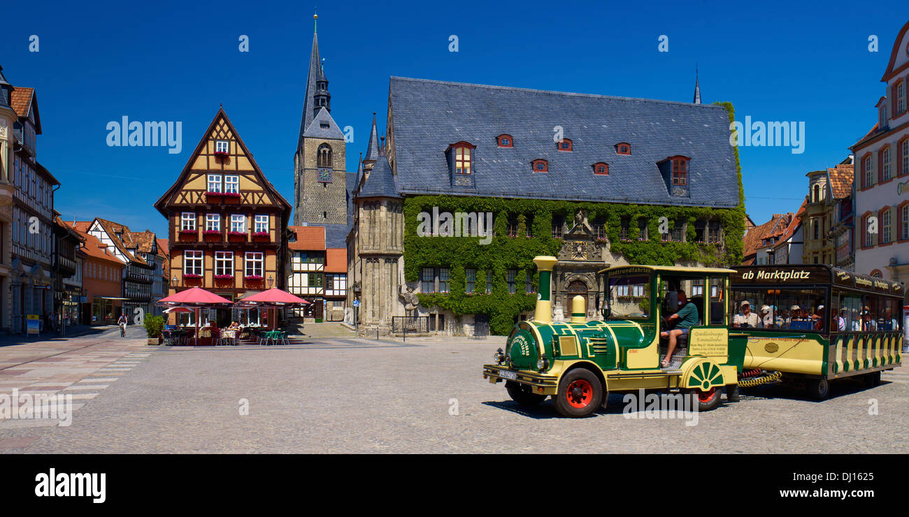 Marketplace with City Hall and St. Benedictine Church, Hoken gastronomy, trackless train, Quedlinburg, Saxony-Anhalt, Germany Stock Photo