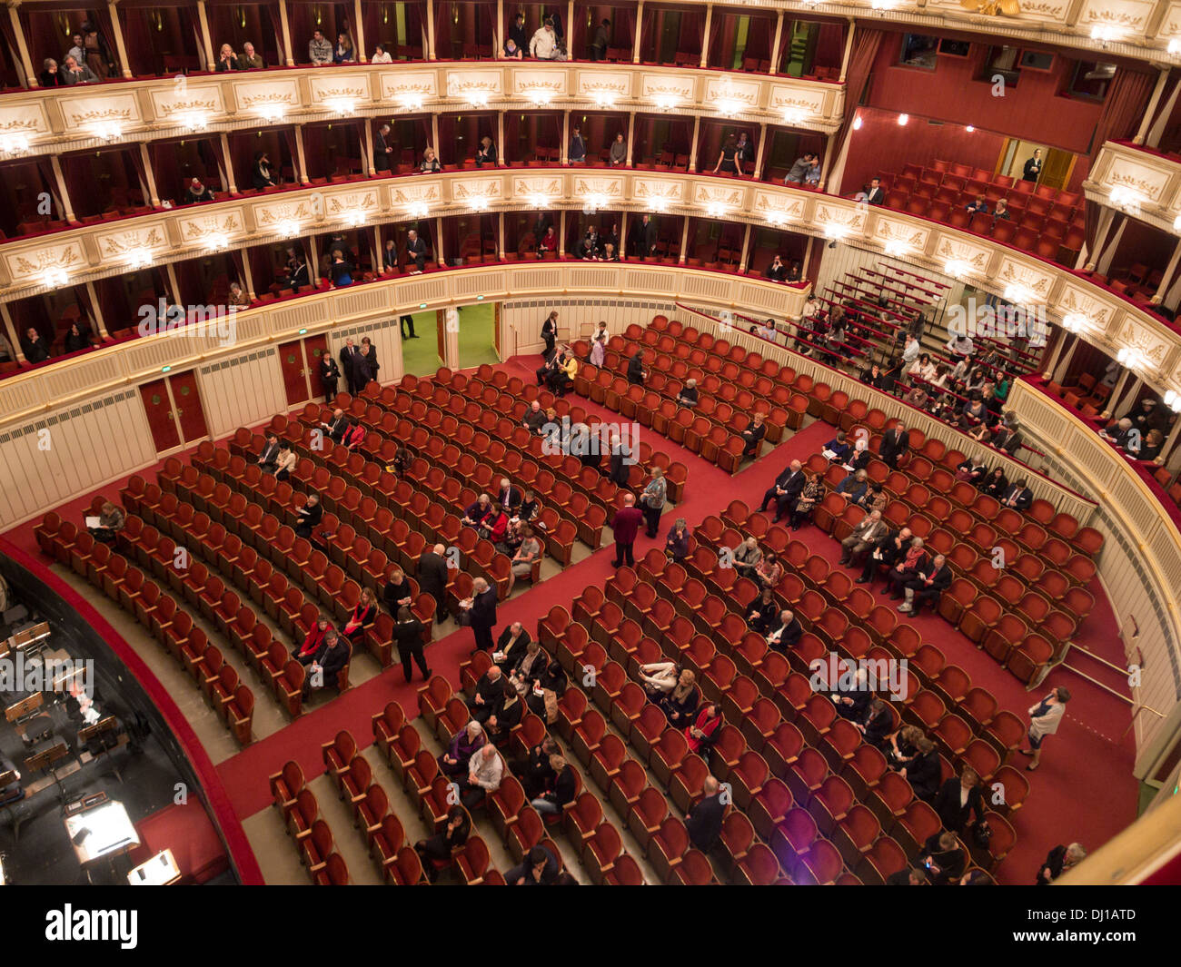 Opera Patrons Gather in the orchestra for a night at the Opera. Many of ...