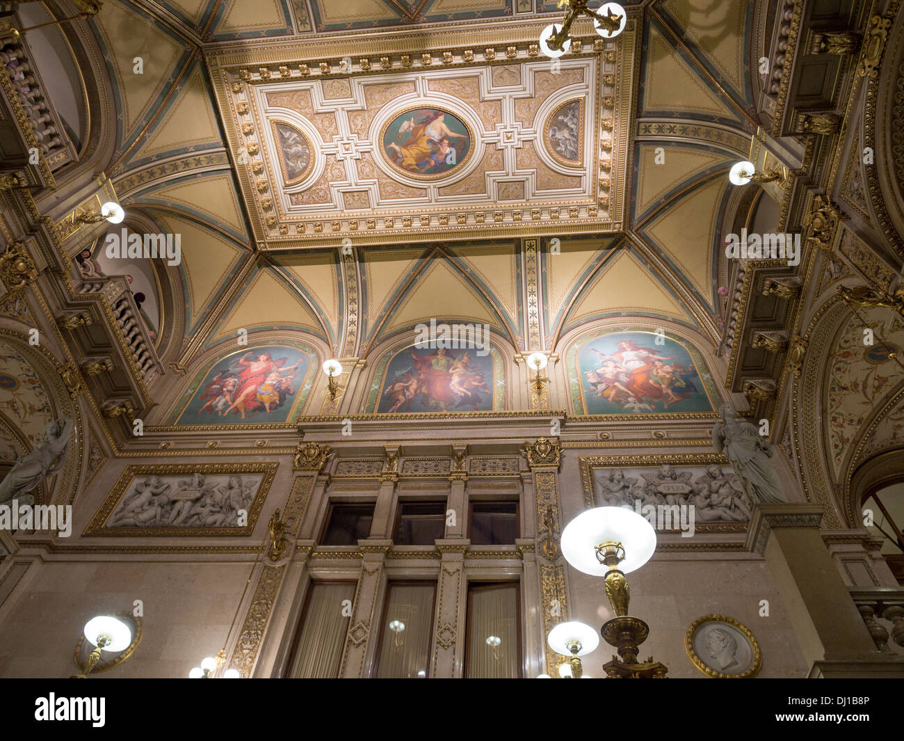 Ceiling above the staircase at Vienna State Opera. The opulent marble foyer ceiling in Vienna's famous Opera House. Stock Photo