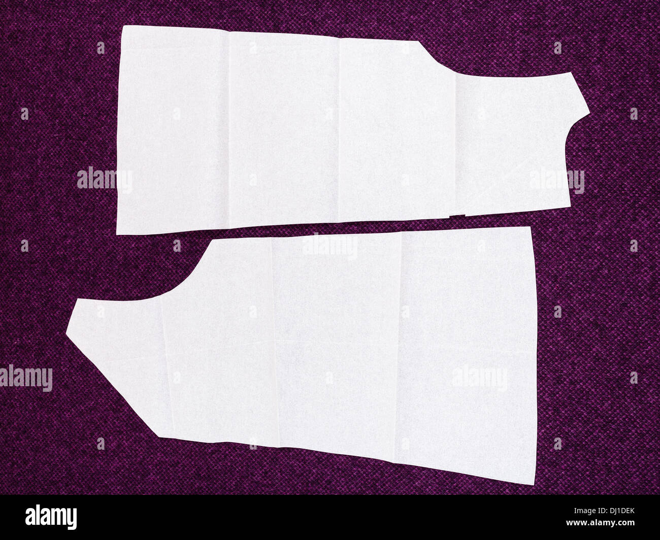 pattern cut of woollen dress on cutting table Stock Photo