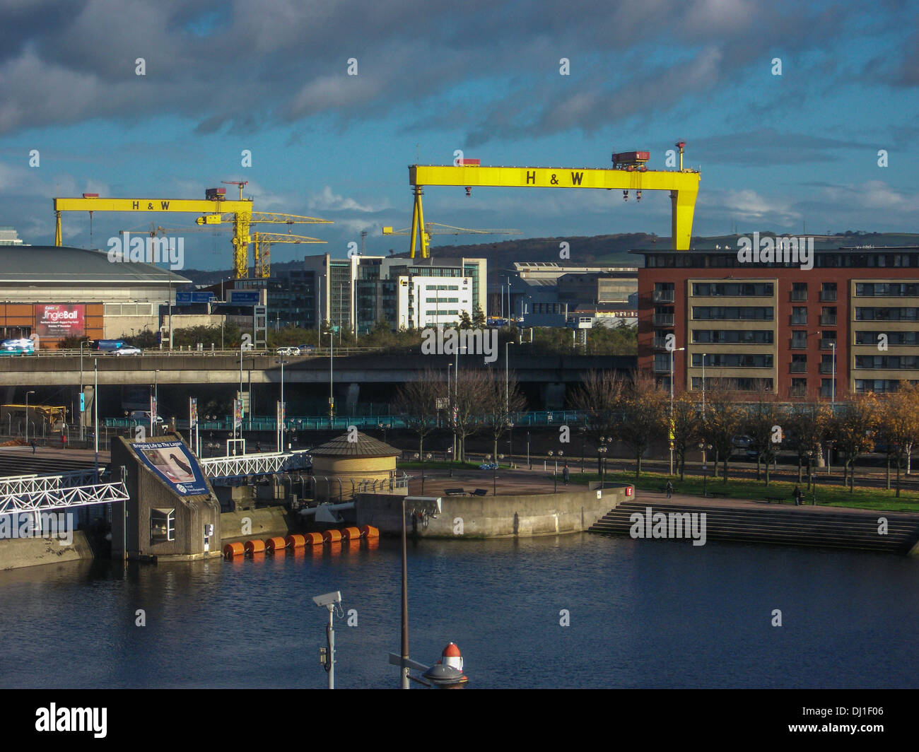 A view across the River Lagan with the Harland & Woolff cranes dominating the skyline Stock Photo