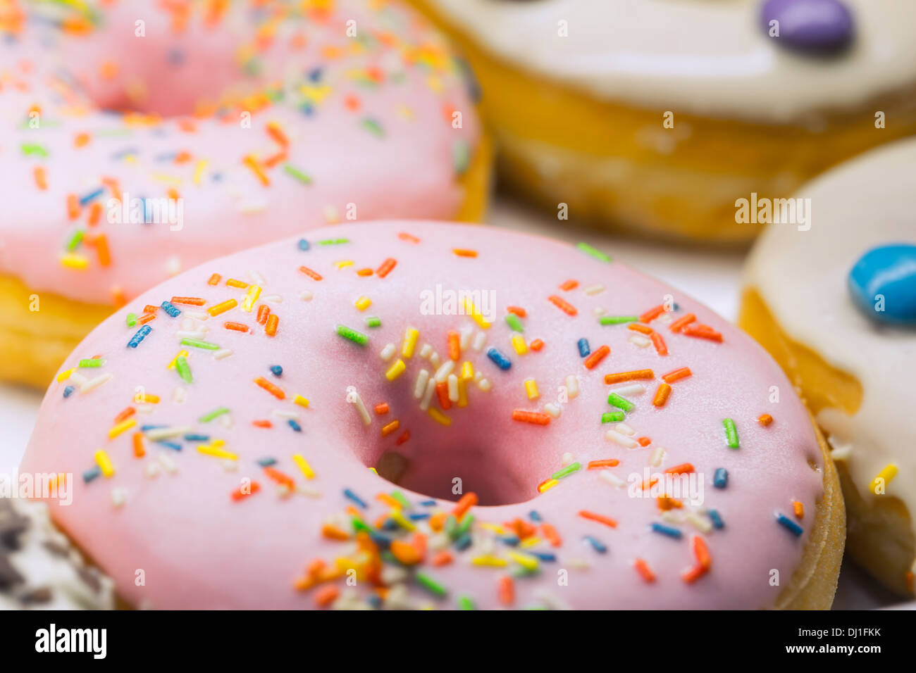 Donuts / doughnuts, close-up at bakery Stock Photo